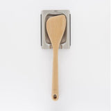 High-quality wooden sauté paddle made of solid beech wood, safe for non-stick cookware with a comfortable grip.