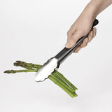 Stainless steel OXO Good Grip Tongs (23cm) with non-slip handles, perfect for cooking and serving various foods.