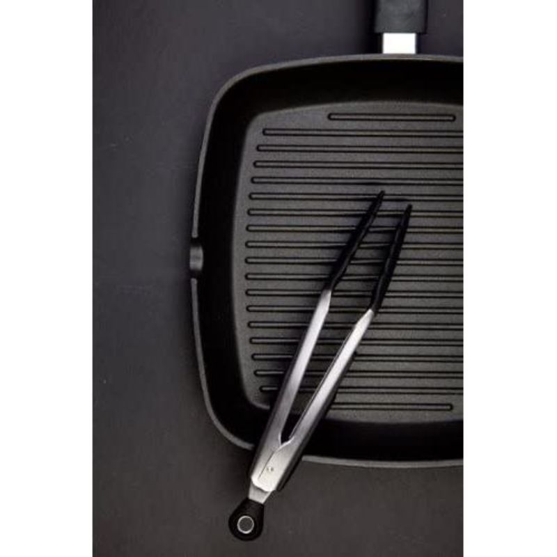 9-inch OXO Good Grips tongs with heat-resistant silicone head, ideal for cooking and serving without damaging non-stick pans.