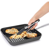 OXO Good Grips 12-inch tongs with silicone heads, heat-resistant, ideal for non-stick cookware, and easy to store.