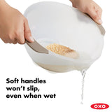 OXO Rice & Grain Washing Colander designed for easy washing of small grains with effective drainage and non-slip handles.