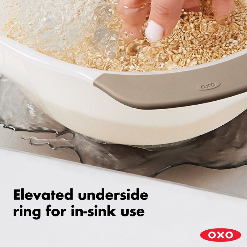 OXO Rice & Grain Washing Colander with drain holes, non-slip handles, and square holes for perfect grain washing and rinsing.