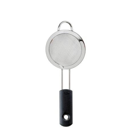 Compact stainless steel mini strainer with fine mesh, ideal for juicing, sifting, and steeping, featuring a non-slip grip.