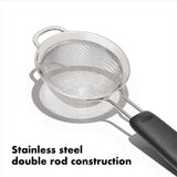 Compact stainless steel mini strainer with fine mesh, ideal for juicing, dusting, and steeping, featuring a non-slip grip.