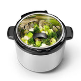 OXO Stainless Steel Steamer with an extendable handle for safe cooking, fits 20cm pots, dishwasher safe, perfect for healthy meals.