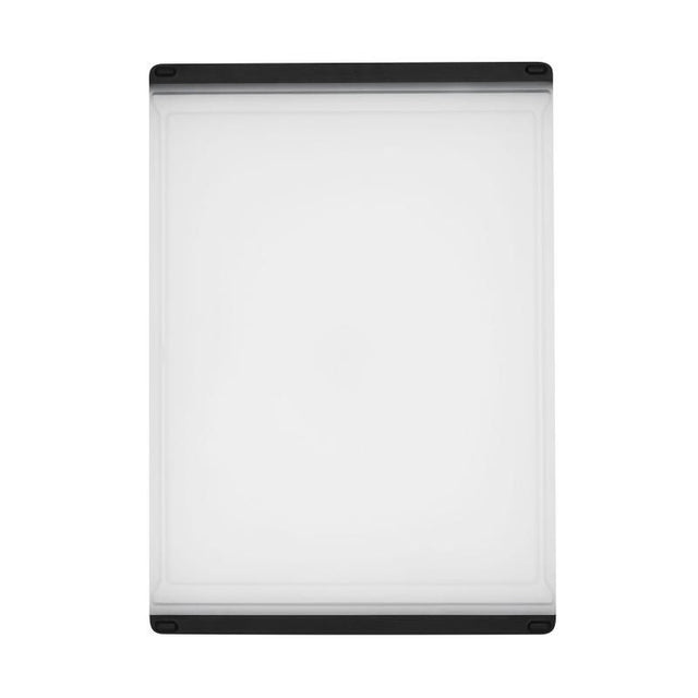 Large OXO Good Grips Utility Cutting Board with non-slip feet and double-sided design, ideal for safe food prep and easy cleanup.