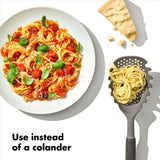 OXO Good Grips Pasta Scoop Strainer with ergonomic handle for easy scooping and straining of pasta, veggies, and eggs.