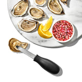 Ergonomic OXO Oyster Knife with non-slip handle and durable bent stainless steel blade for effortless shucking.