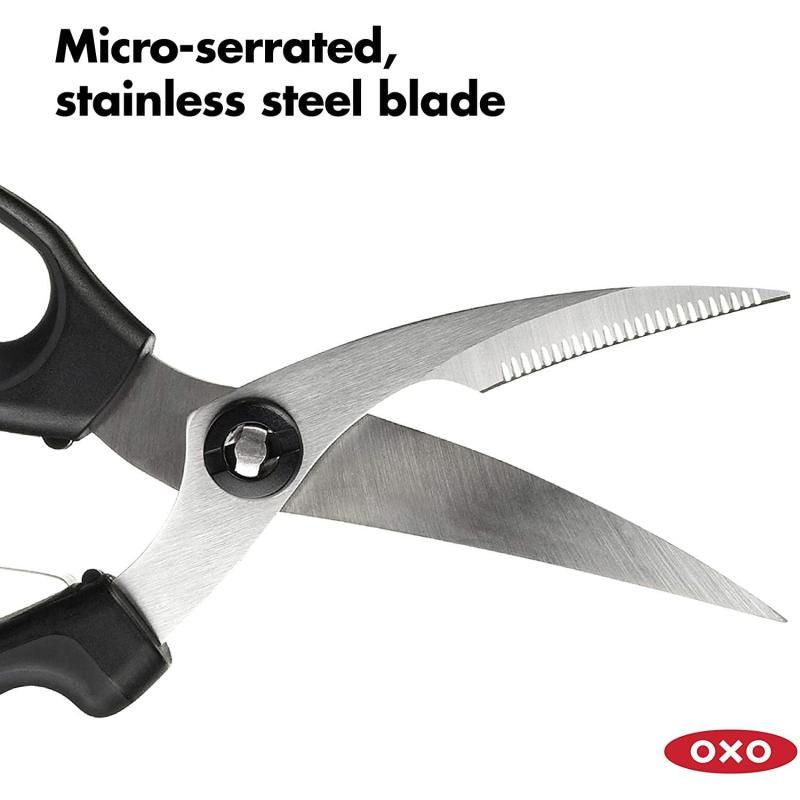 OXO Good Grips Poultry Shears with ergonomic handles, sharp micro-serrated blades, and a safety loop for comfortable cutting.