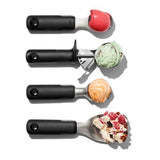 Pointed stainless steel ice cream scoop with ergonomic grip, designed for easy serving of hard frozen treats.