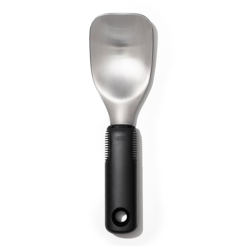 Ergonomic OXO Good Grips Ice Cream Spade with a wide stainless steel head for easy scooping and spreading of desserts.