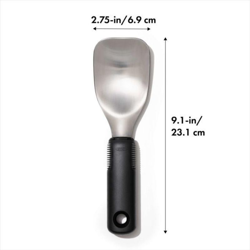 Ergonomic OXO Good Grips Ice Cream Spade featuring a wide stainless steel head for easy scooping and serving of frozen desserts.