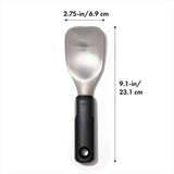 Ergonomic OXO Good Grips Ice Cream Spade featuring a wide stainless steel head for easy scooping and serving of frozen desserts.