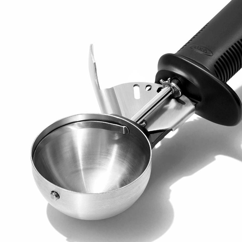 OXO Trigger Ice Cream Scoop with lever release, non-slip handle, and finger guard for easy, perfectly round scoops.