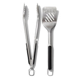 OXO Good Grips Grilling Tongs and Turner Set featuring stainless steel, non-slip grips, and built-in bottle opener for easy grilling.