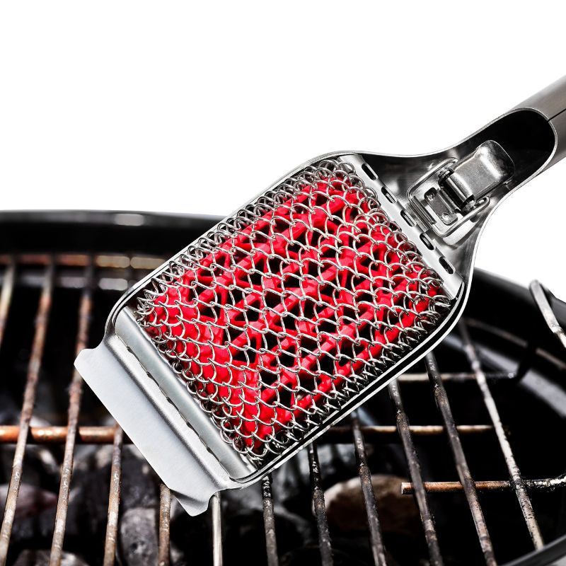 Bristle-free grill brush with stainless steel coils, flexible silicone, and scraper for effortless cleaning of all grill types.