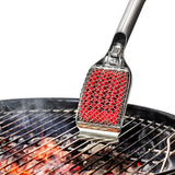 Bristle-free grill brush with stainless steel coils, scraper, and soft-grip handle for easy, safe, and effective grill cleaning.