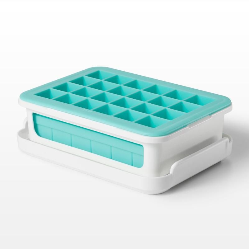 Compact OXO Good Grips Covered Ice Cube Tray creates 48 small, easy-to-remove ice cubes with odor protection and flexible silicone design.