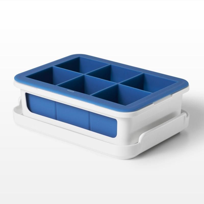 Large OXO Good Grips Covered Ice Cube Tray with six 1¾" silicone ice cubes and protective cover for odor-free storage.