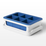 Large OXO Good Grips Covered Ice Cube Tray with six 1¾" silicone ice cubes and protective cover for odor-free storage.