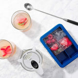 Large OXO Good Grips ice cube tray with cover, making uniform ice cubes while preventing freezer odor absorption.