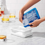 Large OXO Good Grips ice cube tray with covered design, creates six 1¾" cubes, made from flexible silicone for easy ice removal.