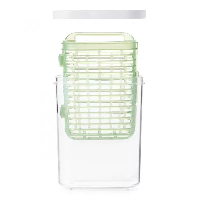 Compact herb keeper with moisture management for fresh basil, parsley, and cilantro; features air circulation and easy access.