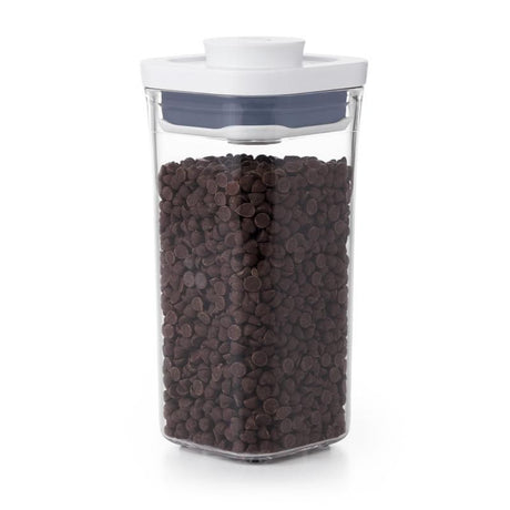 Airtight OXO Good Grips POP 2.0 Mini Square container, ideal for storing grains and spices, with space-saving design and easy-pour corners.