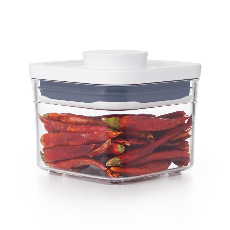 Compact OXO Good Grips POP 2.0 mini container for snacks or supplies, featuring airtight seal and stackable design.