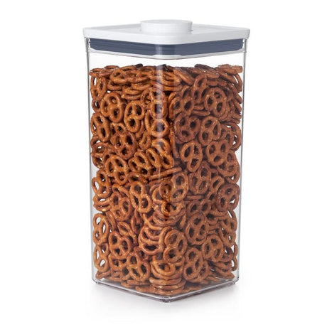 A spacious 5.7L airtight container for organizing snacks, featuring push-button sealing and a clear, stackable design.