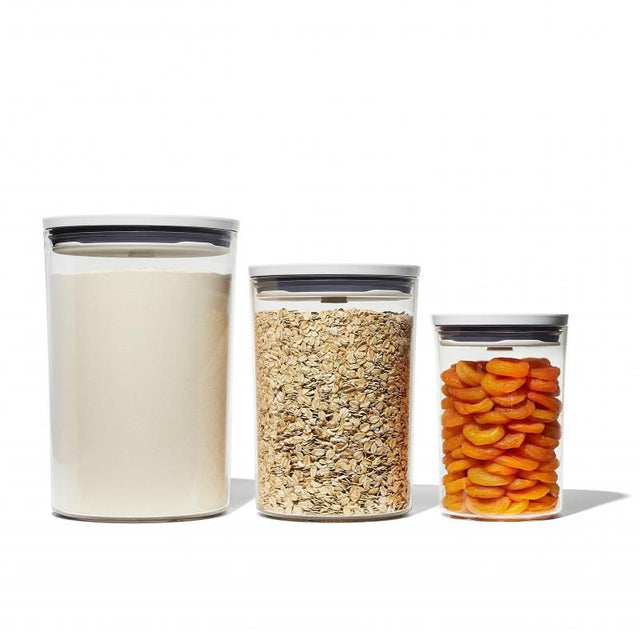 OXO Good Grips Round Pop 2.0 canister set with airtight seals, three sizes, ideal for storing dry foods and organizing.