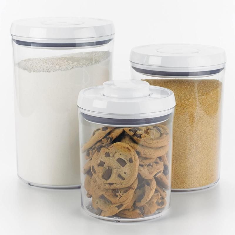 OXO Good Grips Round Pop 2.0 canister set, featuring three sizes with airtight seals for fresh food storage and organization.