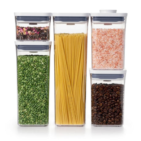 A sleek 5-piece container set with various sizes for organized pantry storage, featuring airtight seals and easy-pour corners.