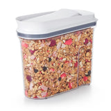 Small OXO Good Grips POP Cereal Dispenser with pop-open lid and airtight seal for fresh, mess-free cereal storage.