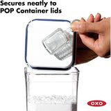 OXO Good Grips Pop Dusting Scoop, ideal for dusting flour and cocoa, attaches to OXO POP lids for tidy kitchen storage.