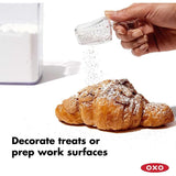 OXO Good Grips Pop Dusting Scoop for easy, precise dusting of flour, sugar, and cocoa; attaches to POP container lids for storage.