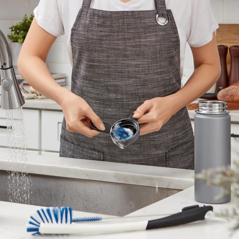 OXO Water Bottle Cleaning Set with long brush, straw brush, and detail cleaner for thorough hygiene and organization.