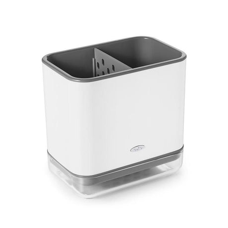 Crock-style sink caddy with compartments for brushes and sponges, featuring drainage holes and removable drip tray for easy cleanup.