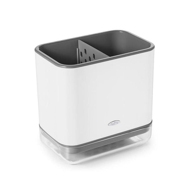 Crock-style sink caddy with compartments for brushes and sponges, featuring drainage holes and removable drip tray for easy cleanup.