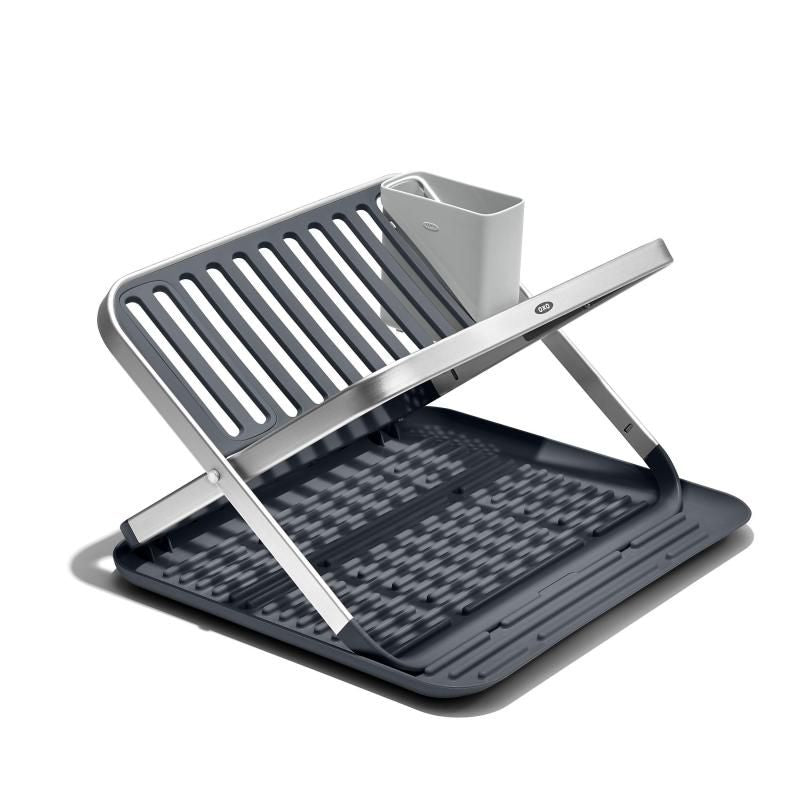 Aluminum fold-flat drying rack with two layers, removable utensil cup, and non-slip feet for efficient dish drying.