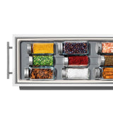 Compact spice drawer organiser with tiered design for visibility, non-slip feet, and removable tray for easy cleaning.