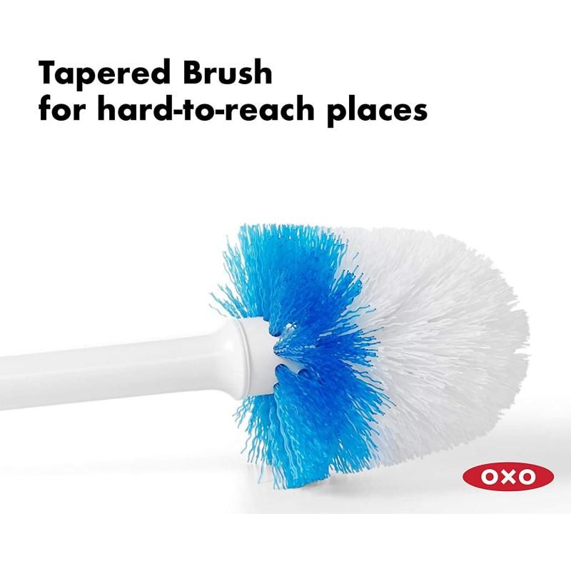 Compact toilet brush with ergonomic handle and hygienic canister, perfect for efficient cleaning and storage in small bathrooms.