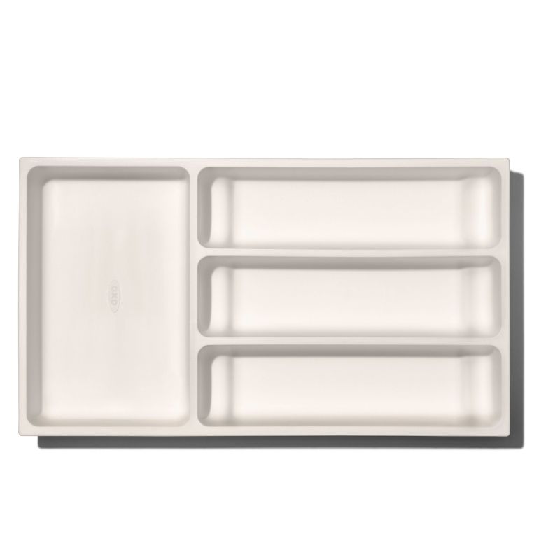 Expandable utensil drawer organizer from OXO, designed for efficient storage and easy access to kitchen tools.