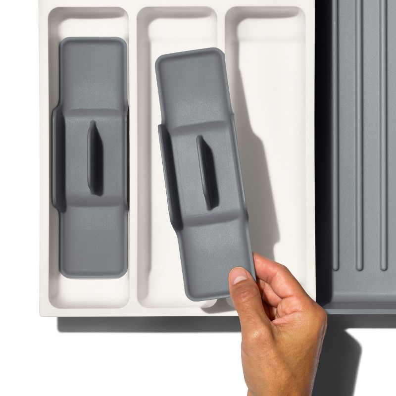 OXO Expandable Utensil Drawer Organiser with removable cups, ideal for decluttering and maximizing kitchen drawer space.