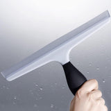 Versatile OXO Good Grips squeegee with a flexible blade and non-slip handle for effortless, streak-free cleaning of various surfaces.