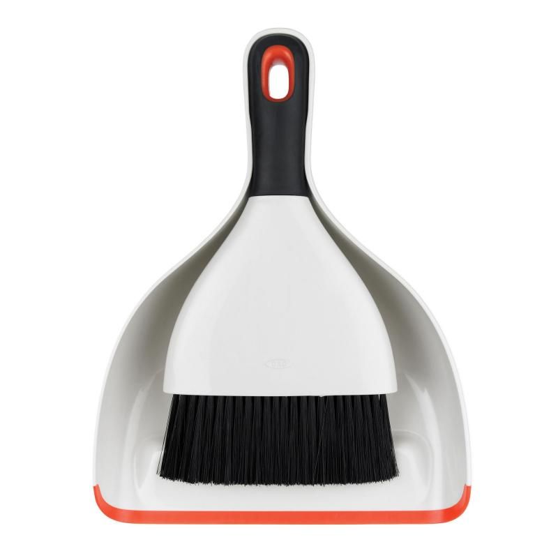 Ergonomic OXO Good Grips Dustpan & Brush Set with whisk-broom design for easy sweeping and storage, perfect for effective cleaning.