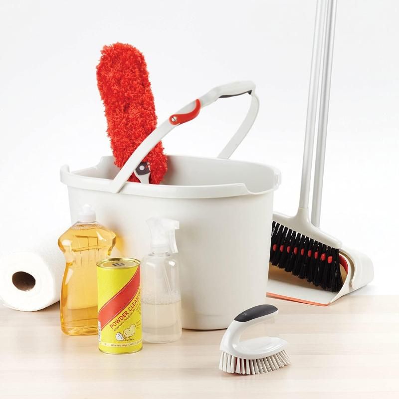 Flexible OXO Good Grips Microfiber Hand Duster with a non-slip grip, ideal for efficient dusting in tight spaces.