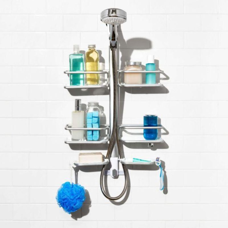 Aluminum shower caddy with hose keeper, four shelves, soap dishes, and hooks for organized bathroom essentials.