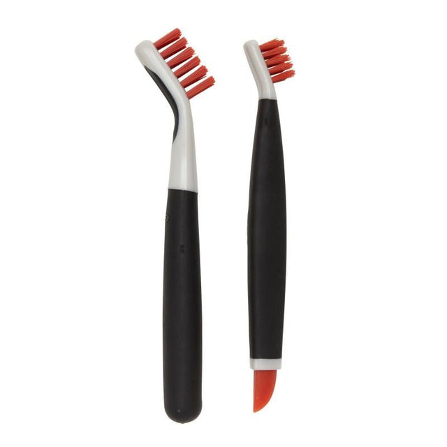 Set of OXO Good Grip Deep Clean Brushes featuring large and small brushes for tackling tough grime in tight spaces.