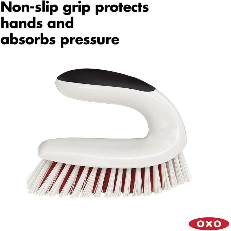 OXO Good Grips All-Purpose Scrub Brush with ergonomic non-slip handle and mixed bristles for effective cleaning on various surfaces.